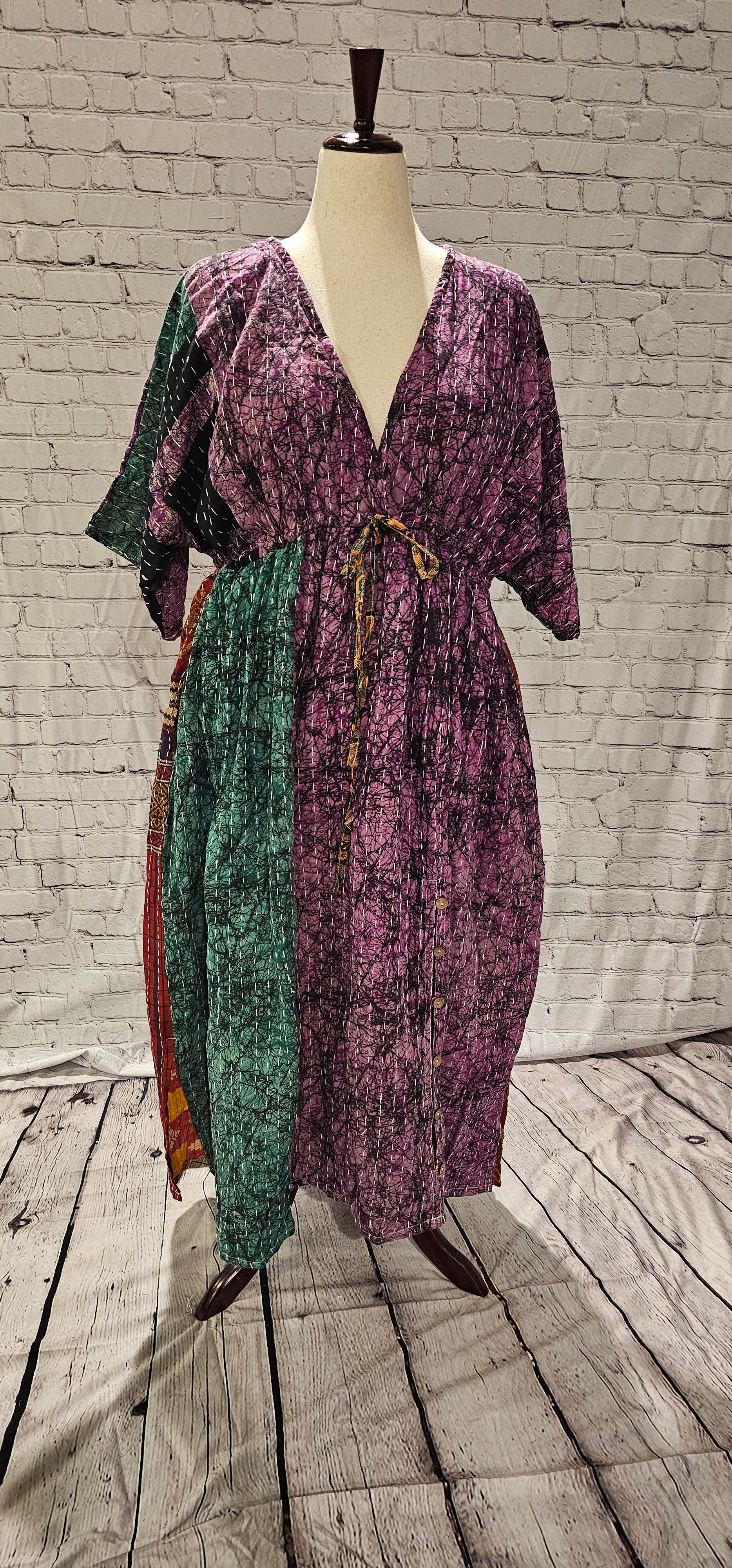 Sustainable cotton Kantha patchwork dress, one-of-a-kind boho fashion shown on mannequin.