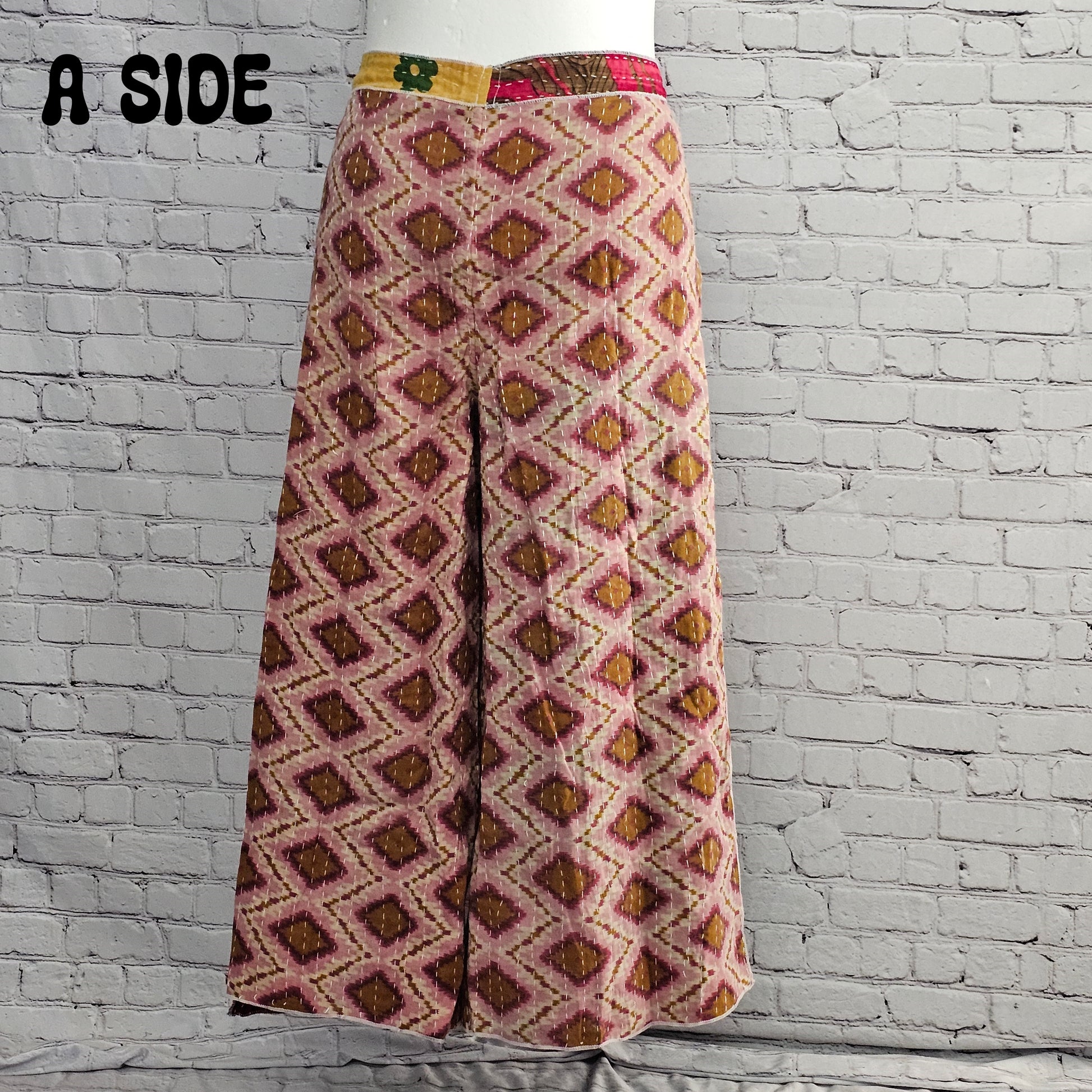 Bohemian reversible Kantha wrap pants on model, eco-friendly unisex loungewear.