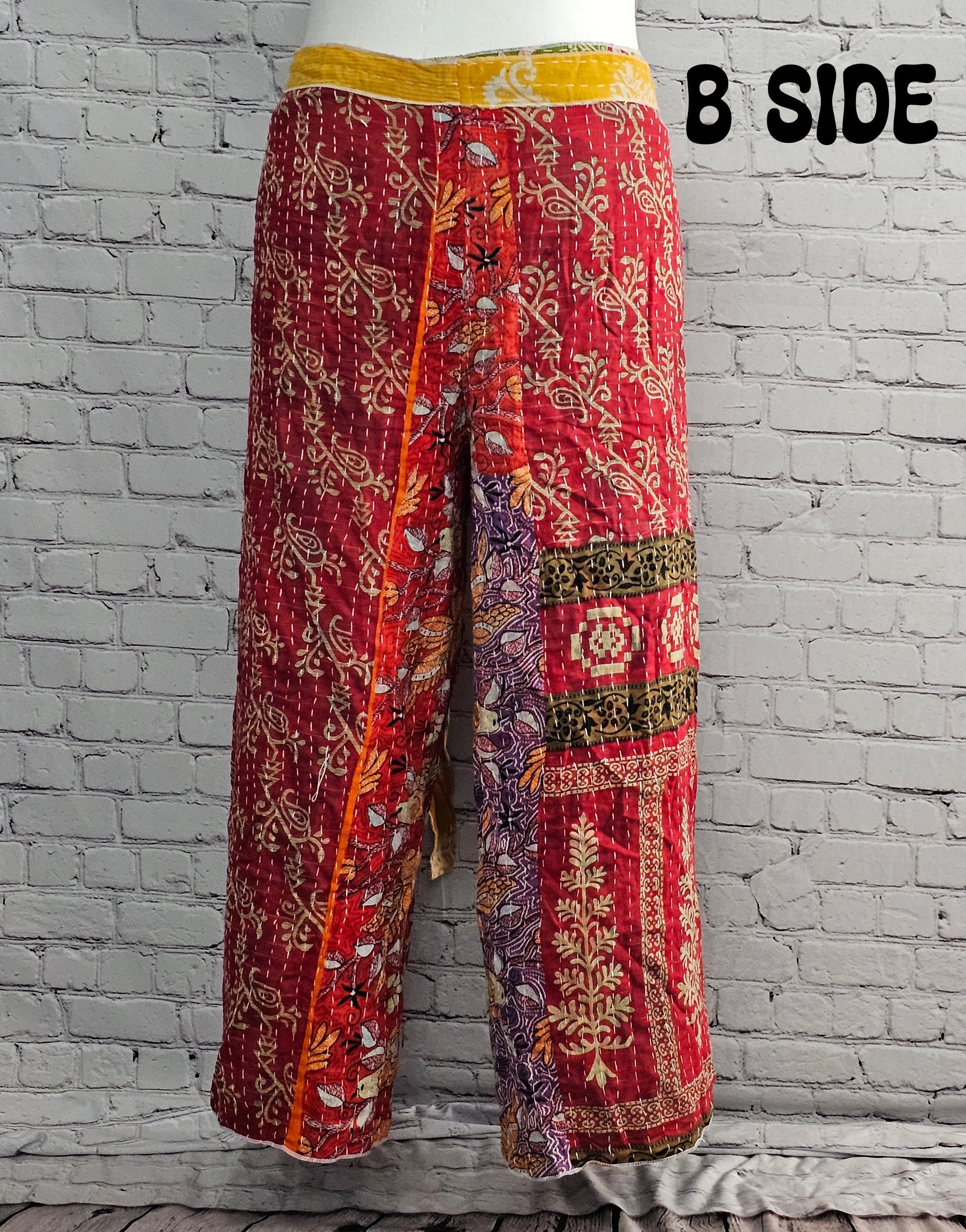 Bohemian reversible Kantha wrap pants on model, eco-friendly unisex loungewear.