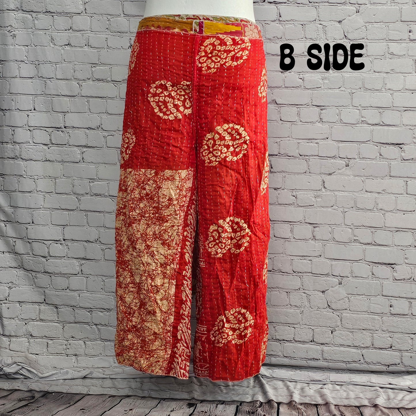 Ronin reversible Kantha patchwork pants in red paisley, sustainable unisex fashion.
