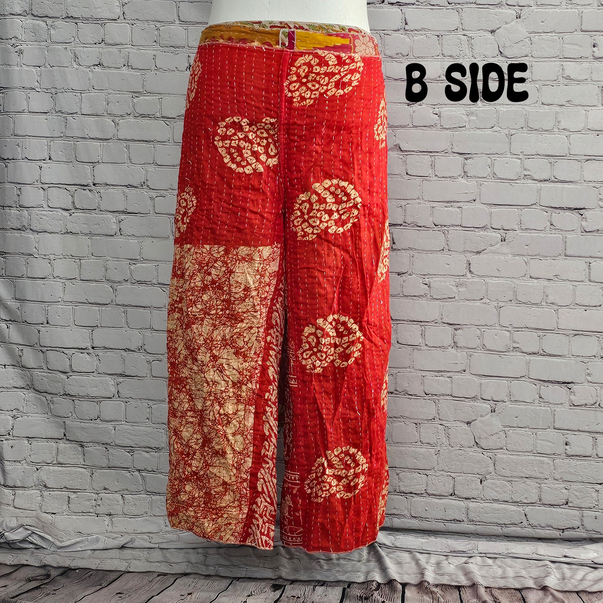Ronin reversible Kantha patchwork pants in red paisley, sustainable unisex fashion.