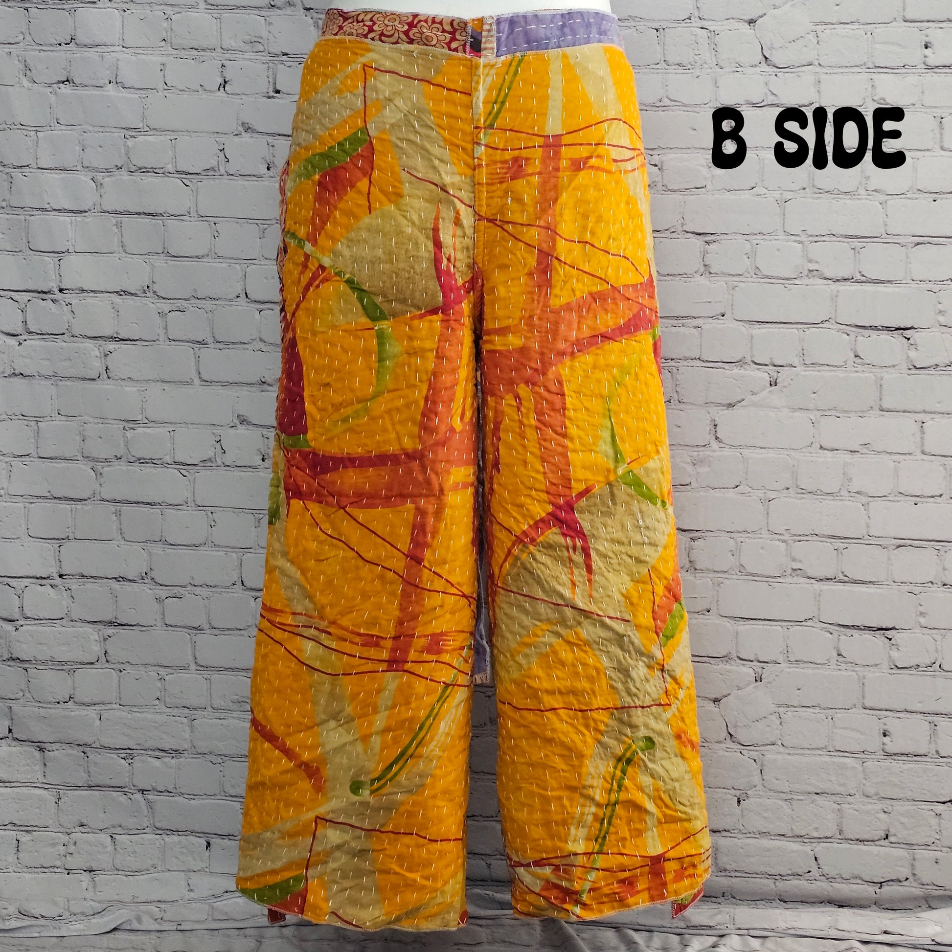 Unisex boho reversible Kantha wrap pants, sustainable cotton patchwork clothing.