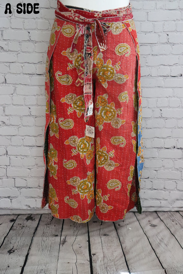 Front view of Ronin Kantha unisex wrap pants, made from recycled sari fabric in boho patchwork design.
