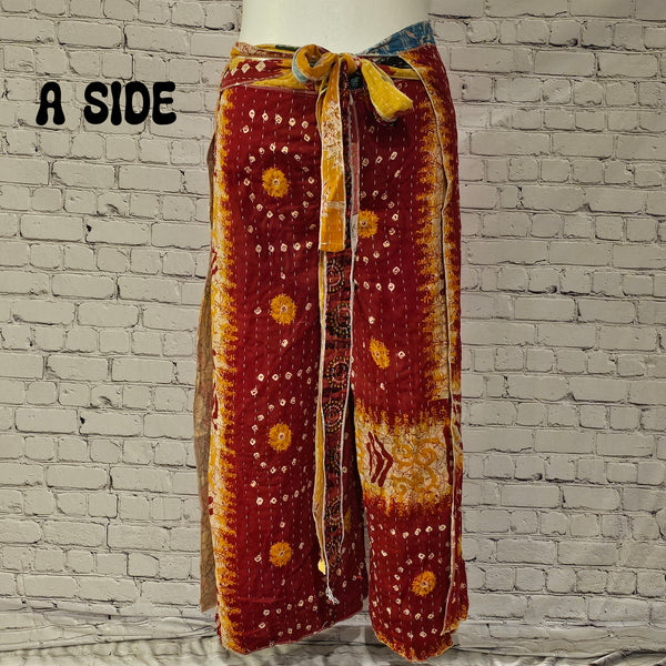 Front view of Ronin Kantha unisex wrap pants, made from recycled sari fabric in boho patchwork design.