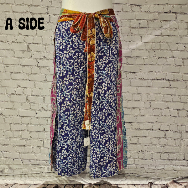 Front view of Ronin Kantha unisex wrap pants, made from recycled sari fabric in boho patchwork design.