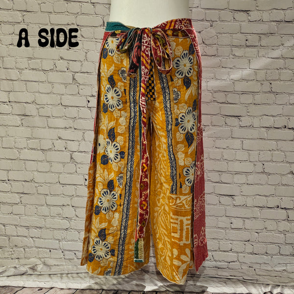 Front view of Ronin Kantha unisex wrap pants, made from recycled sari fabric in boho patchwork design.