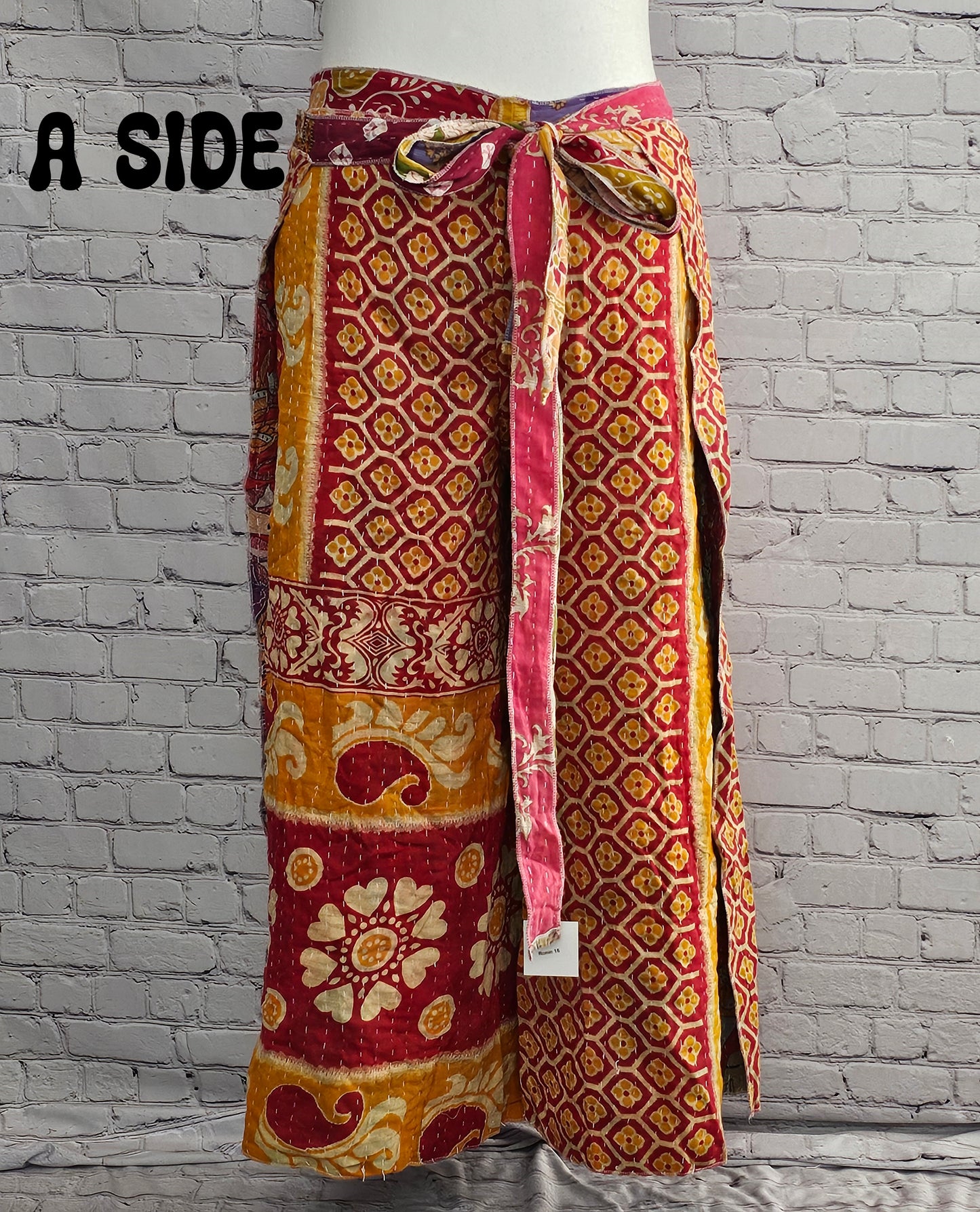 Front view of Ronin reversible boho Kantha wrap pants, handmade from recycled sari fabric.