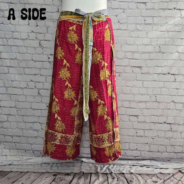 Front view of Ronin Kantha unisex wrap pants, made from recycled sari fabric in boho patchwork design.