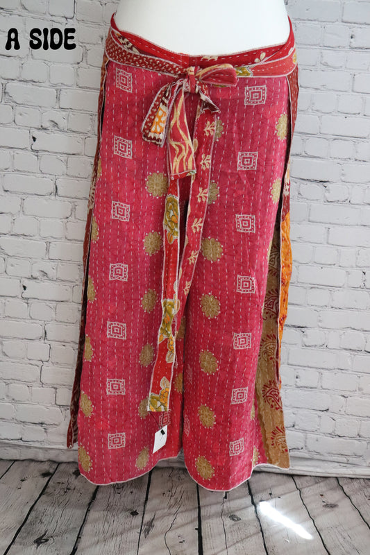 Front view of Ronin Kantha unisex wrap pants, made from recycled sari fabric in boho patchwork design.