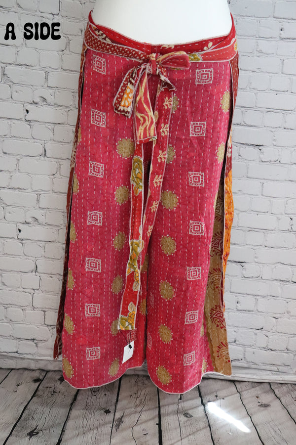 Front view of Ronin Kantha unisex wrap pants, made from recycled sari fabric in boho patchwork design.