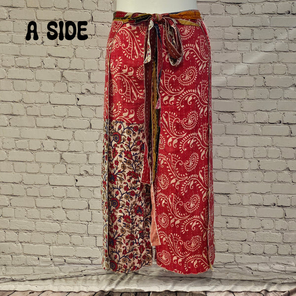 Front view of Ronin Kantha unisex wrap pants, made from recycled sari fabric in boho patchwork design.
