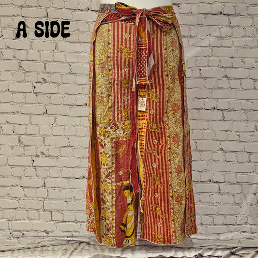 Front view of Ronin Kantha unisex wrap pants, made from recycled sari fabric in boho patchwork design.
