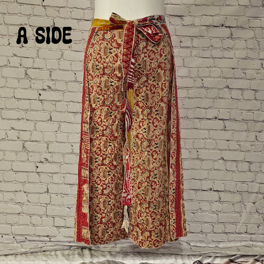 Front view of Ronin Kantha unisex wrap pants, made from recycled sari fabric in boho patchwork design.