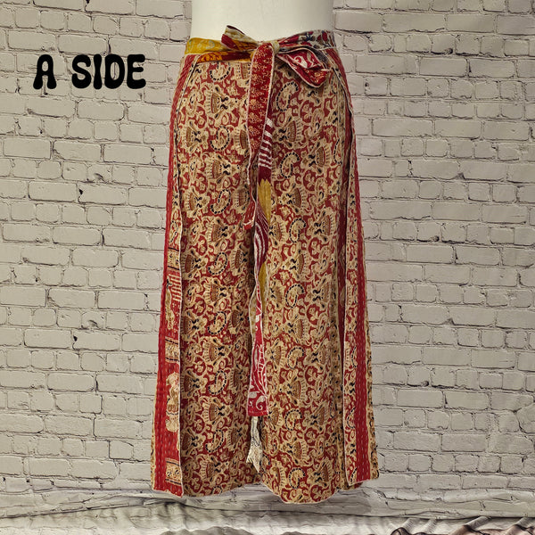 Front view of Ronin Kantha unisex wrap pants, made from recycled sari fabric in boho patchwork design.