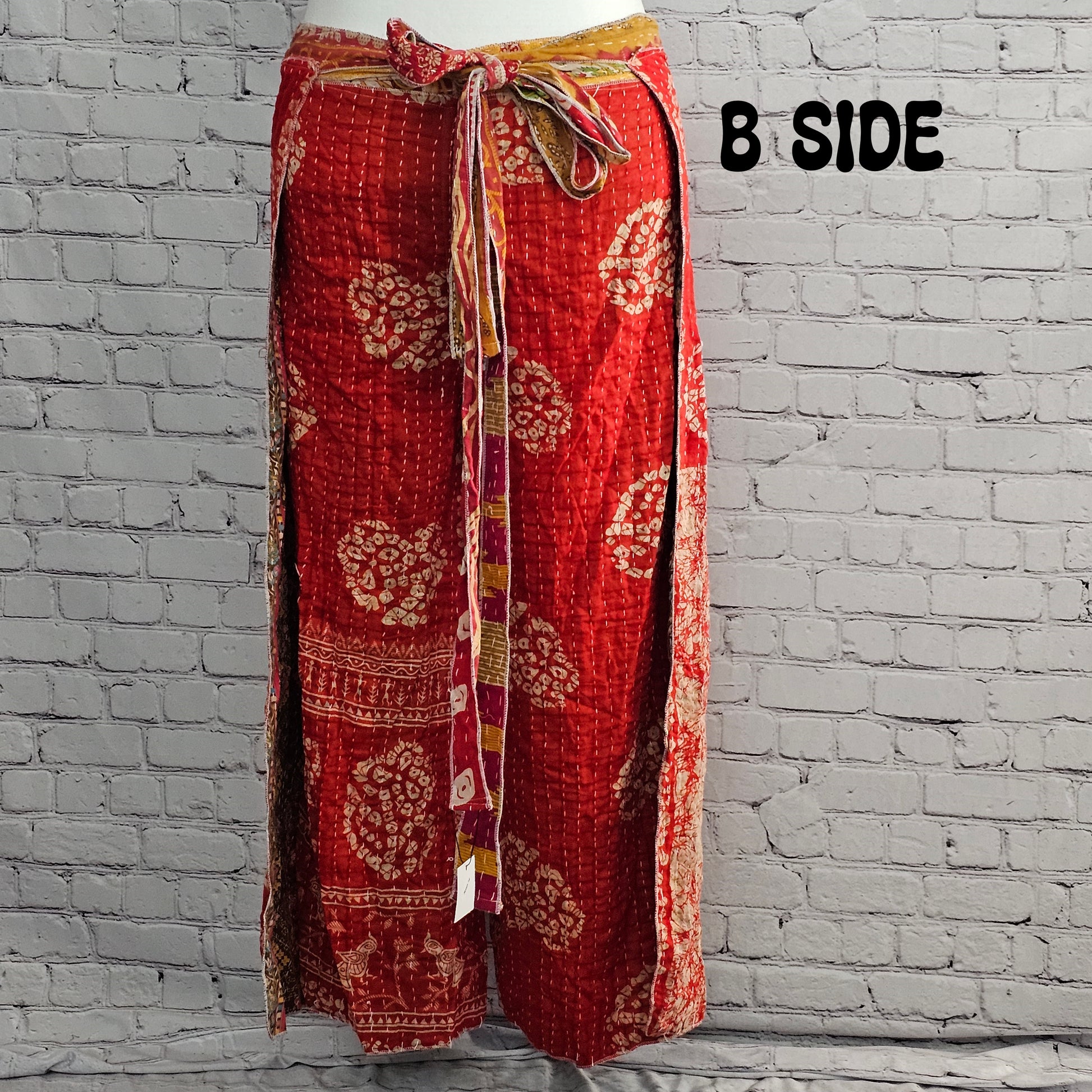 Ronin reversible Kantha patchwork pants in red paisley, sustainable unisex fashion.
