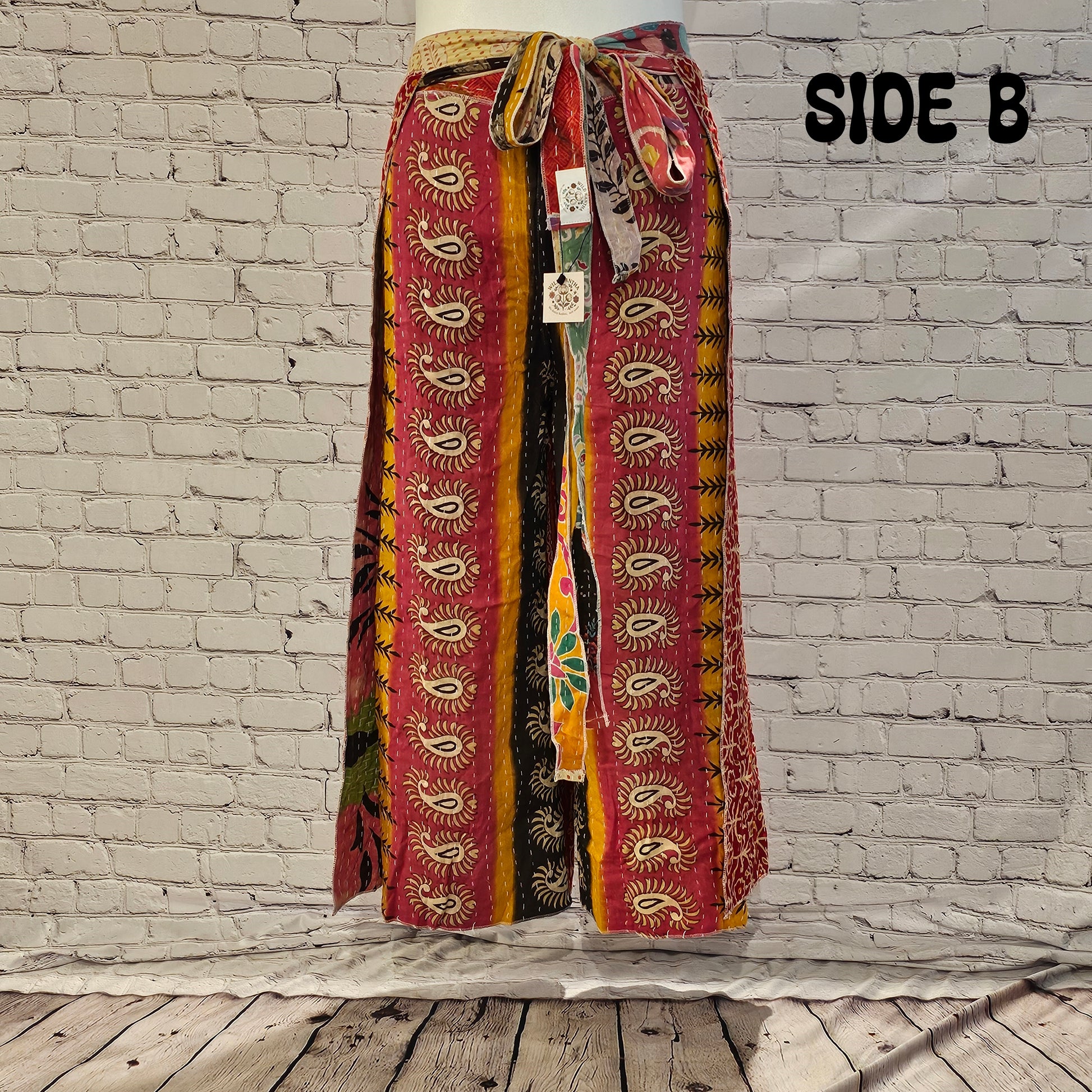 Front view of Ronin reversible boho Kantha wrap pants, handmade from recycled sari fabric.